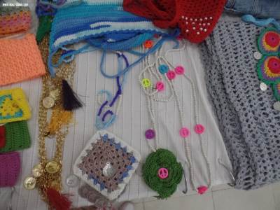 «السوق العربية» تنفرد بدخول قلعة صناعة «الشنطة الحريمى»