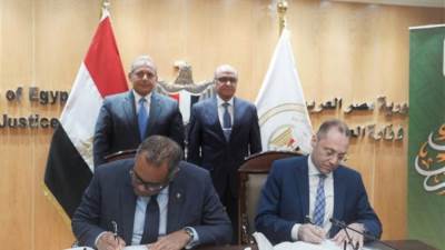 بروتوكول تعاون بين البنك الأهلي المصري ووزارة العدل بهدف تطوير خدمات مصلحة الشهر العقاري والتوثيق