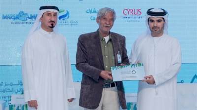 اللجنة العليا المنظمة لمؤتمر عجمان الدولي للبيئة تكرم جريدة السوق العربية المشتركة